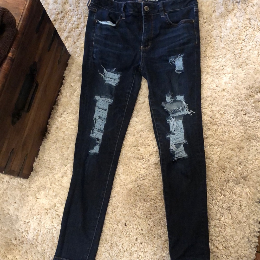 ripped dark american eagle jeans